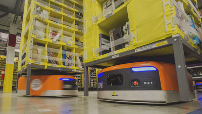 RMF robots moving pods beneath a picking station